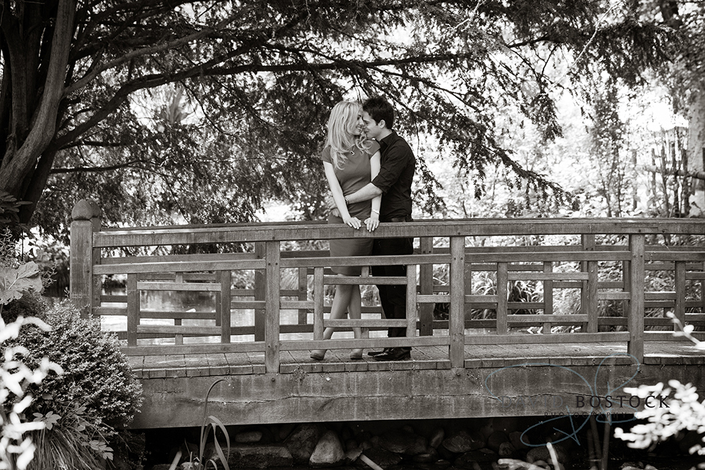 Le manoir engagement shoot black and white on bridge