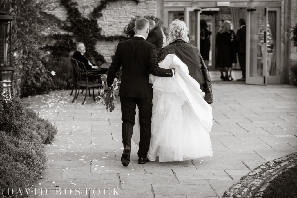 groom helping bride