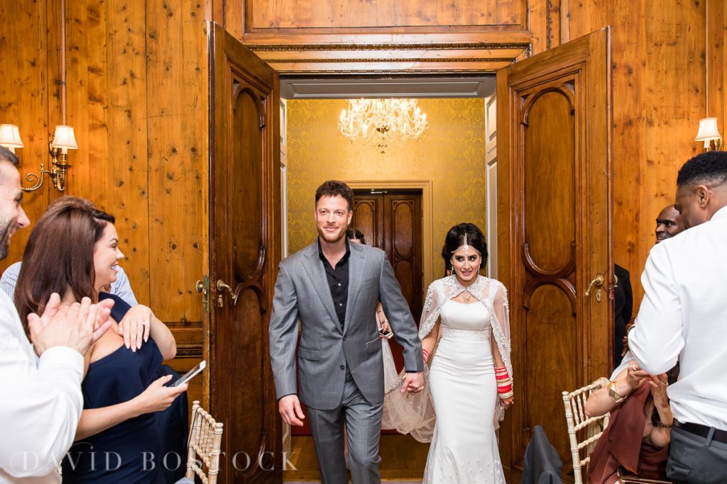 bride and groom enter reception