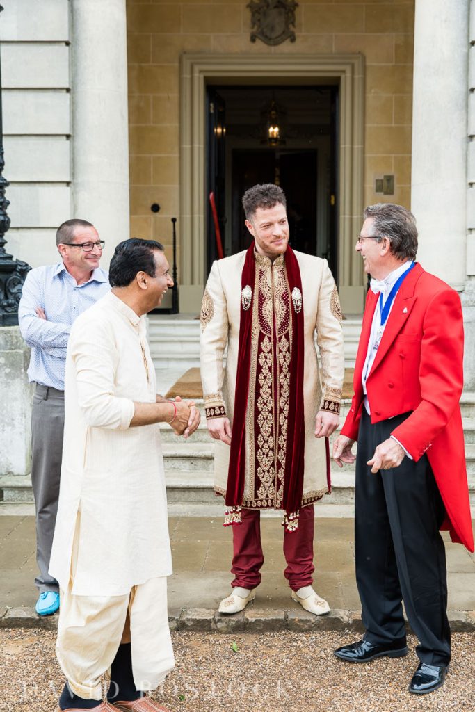 groom with master of ceremonies