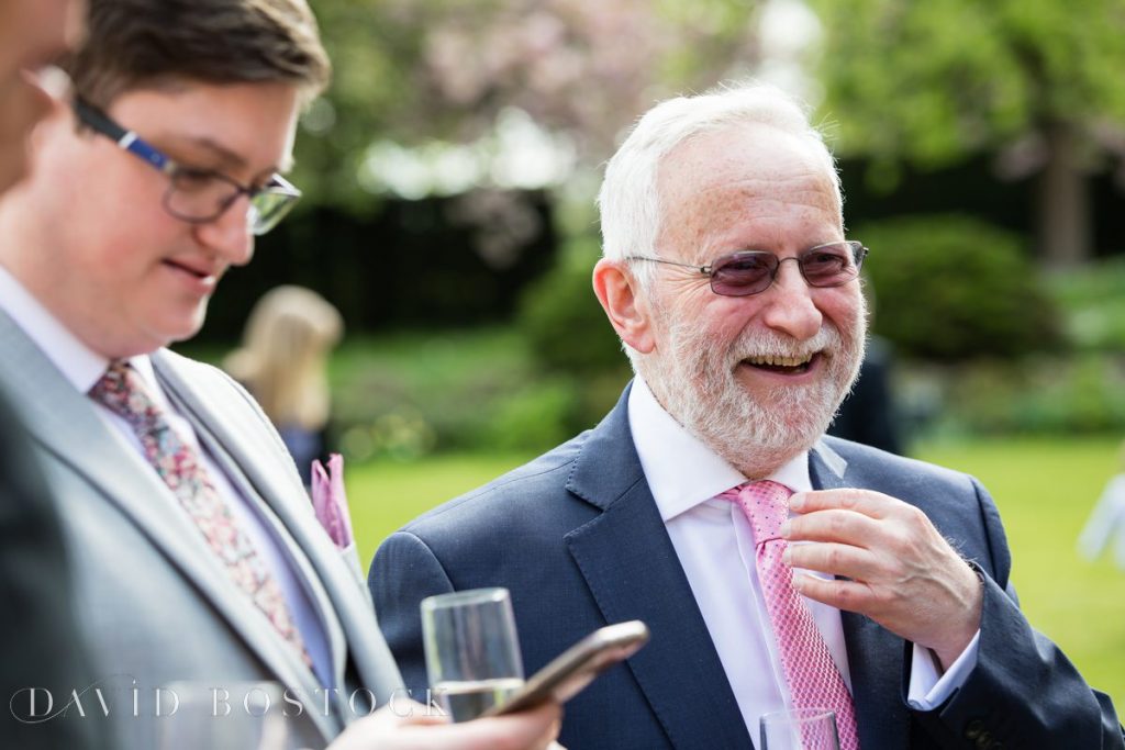 wedding guest laughing