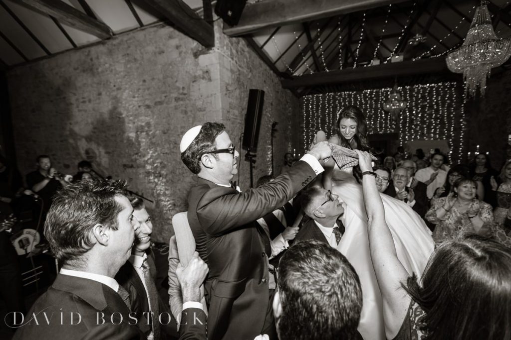 bride and groom chair dancing 