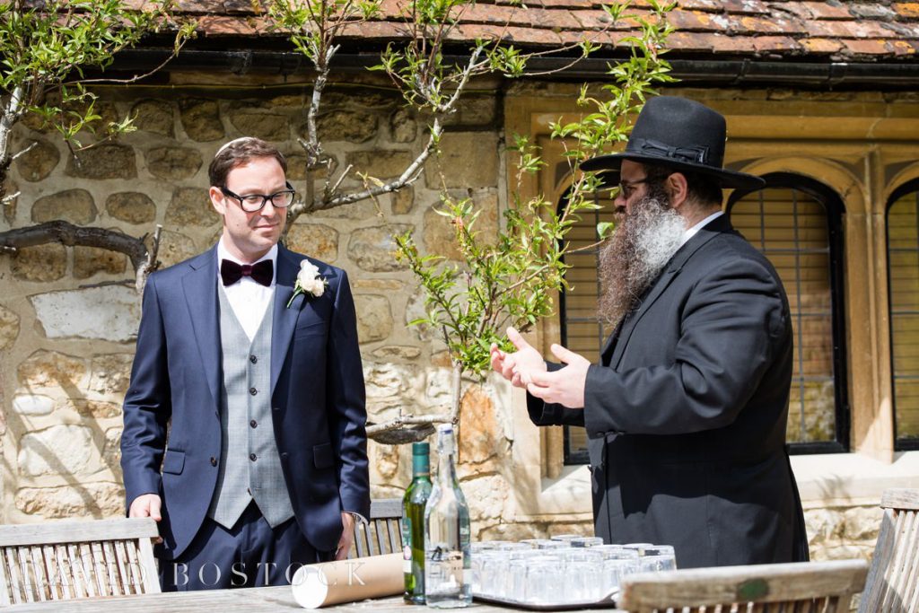 Rabbi and groom