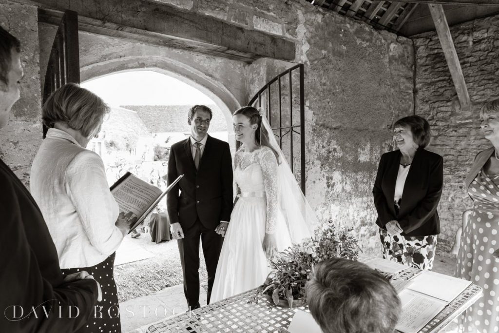 Caswell House Spring Wedding saying vows