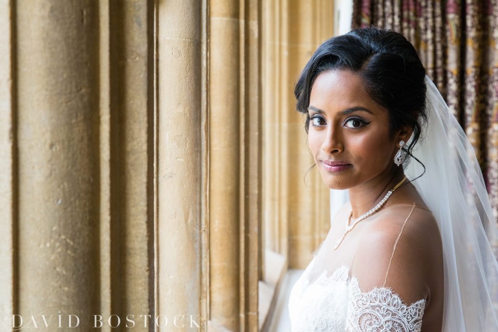 Eynsham Hall Wedding bride by a window