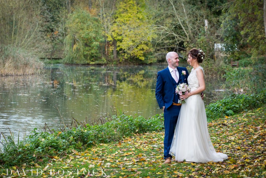 The Great Barn Aynho Wedding Photographs bride and groom by lake