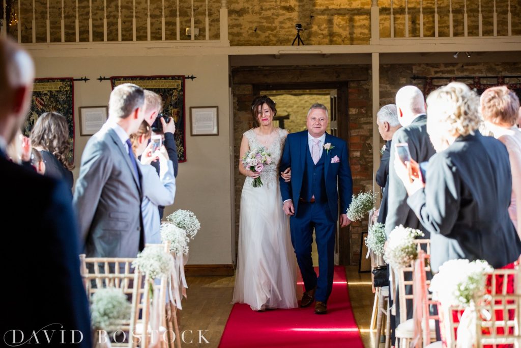 The Great Barn Aynho Wedding Photographs bride on aisle 