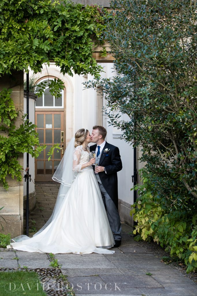 Ashmolean wedding Regents Park College bride and groom kissing