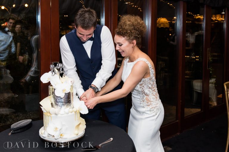 The Crazy Bear bride and groom cutting cake