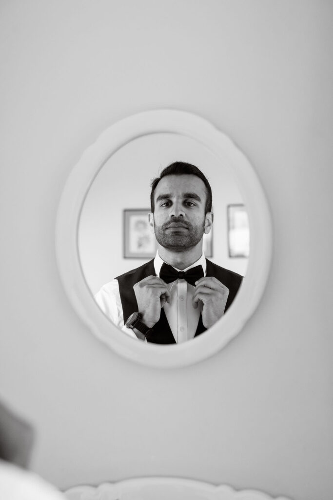 Ardington House wedding photo groom in mirror