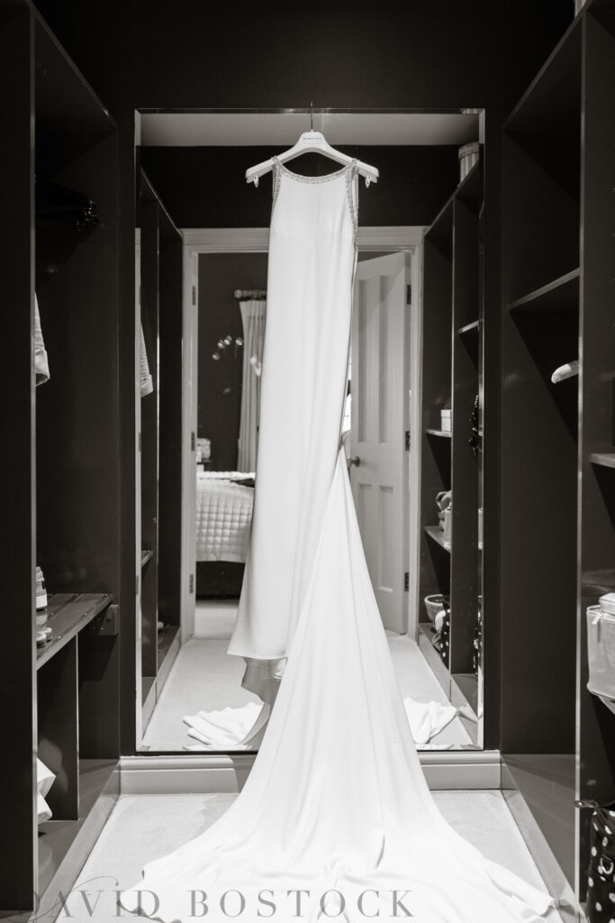 Marylise wedding dress hanging up in Le Manoir